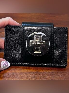 Kate Spade black pebbled leather turn lock card holder